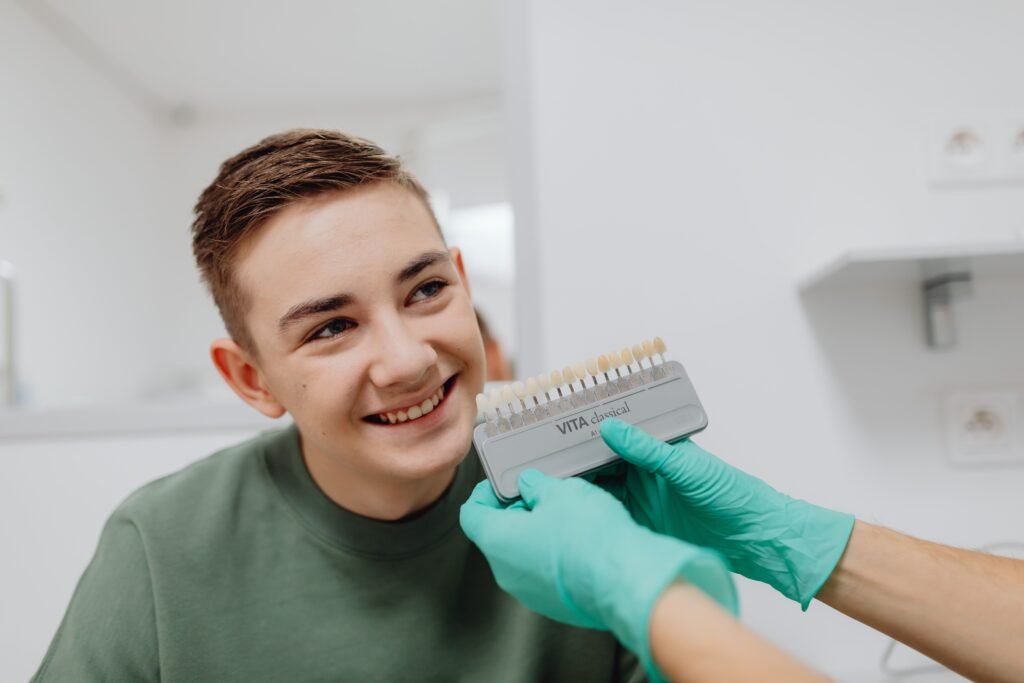 A patient reviewing his dental insurance benefits during a consultation at Matthews Dental Spa